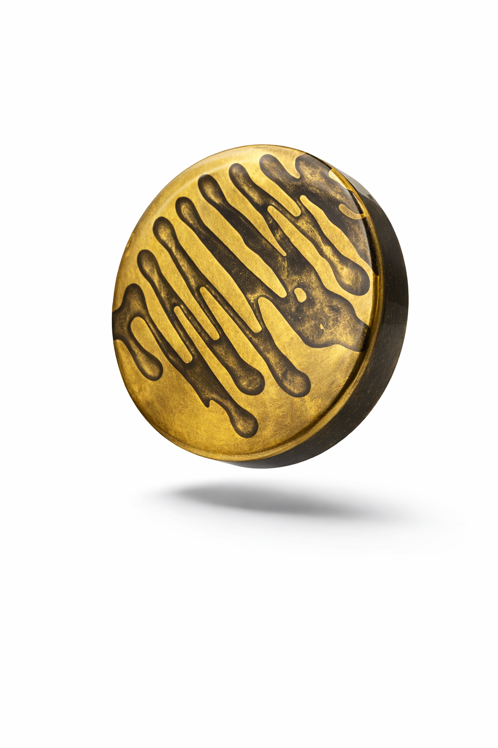 Gold and black decorative object on a white background